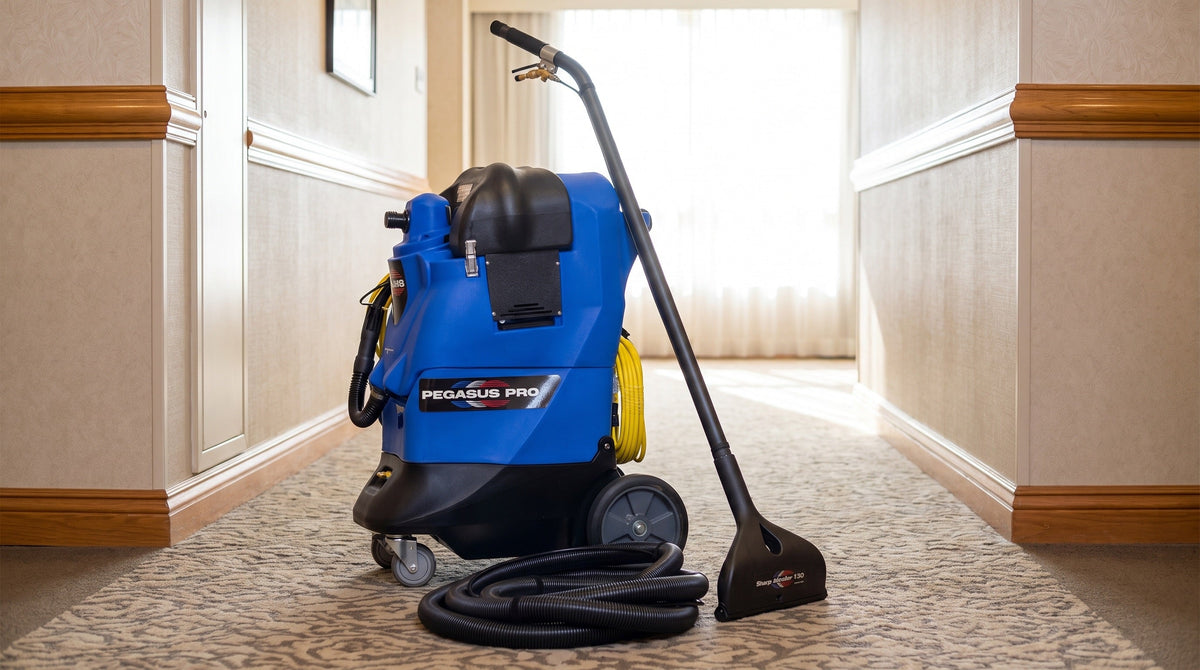 Commercial heated carpet extractor on office carpet in a hotel corridor